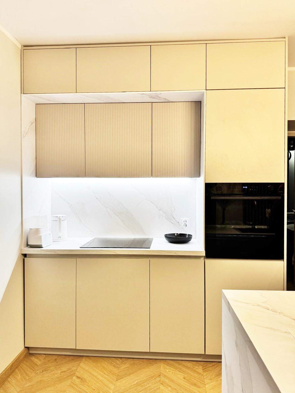 nowoczesna designerska biała kuchnia  na wymiar 